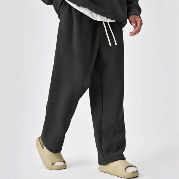 Einfarbige Jogginghose für Herren mit Kordelzug und elastischer Taille und geradem Bein