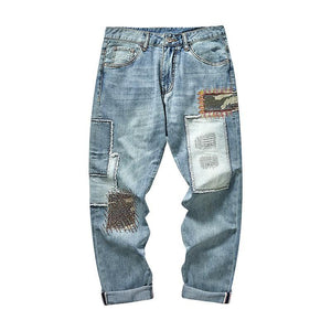 Herrenjeans mit Patchwork-Stickerei