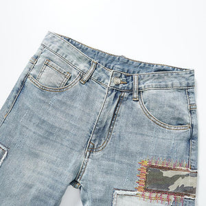 Herrenjeans mit Patchwork-Stickerei