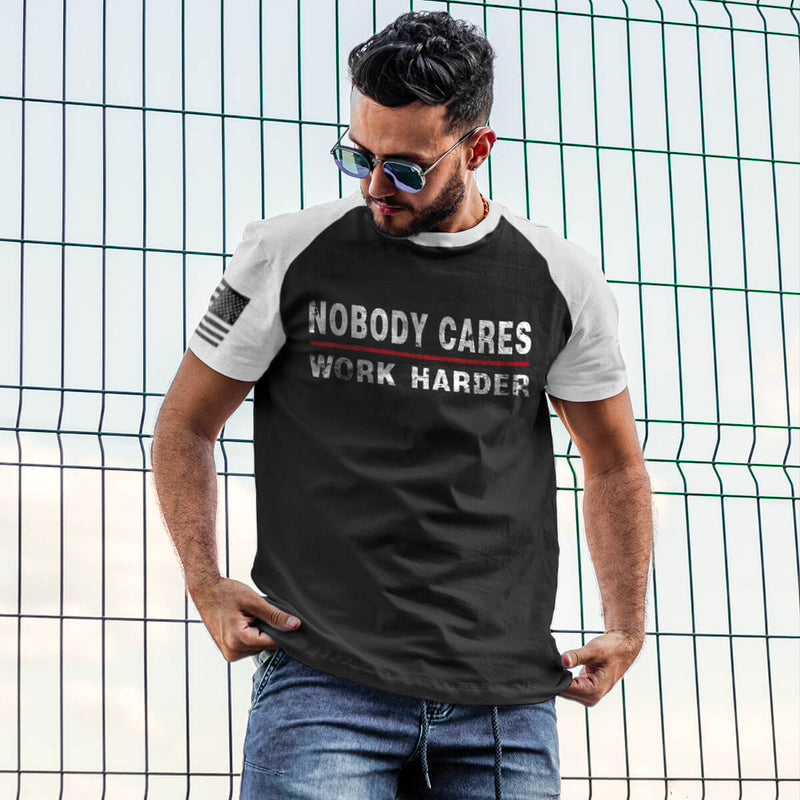 NOBODY CARES WORK HARDER 100% COTTON RAGLAN GRAPHIC TEE